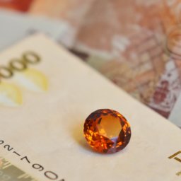 gemstones from uganda and currency note