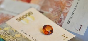 gemstones from uganda and currency note