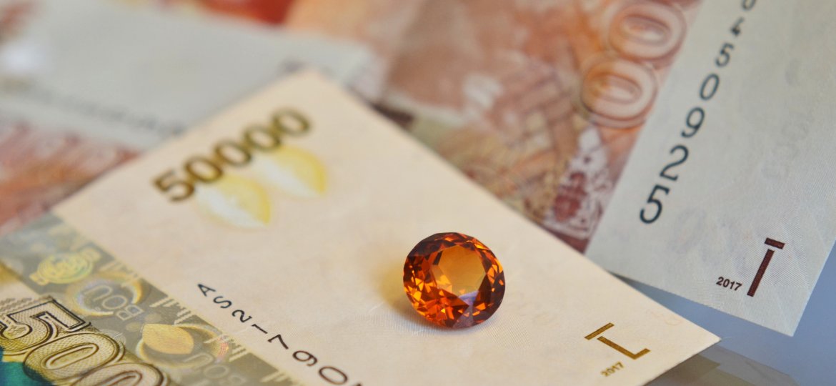 gemstones from uganda and currency note
